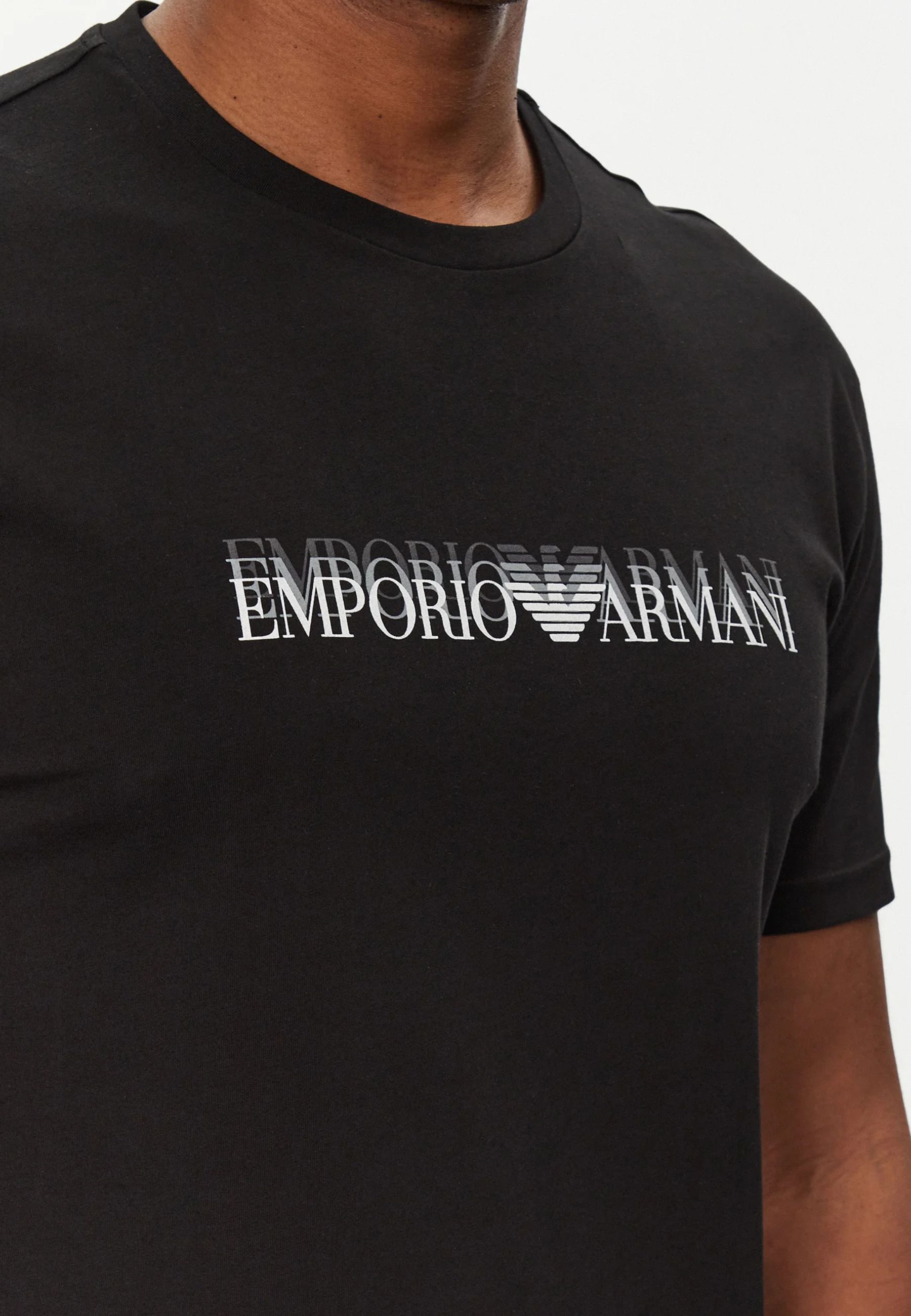 T-shirt realizzata in maglia con stampa EMPORIO ARMANI